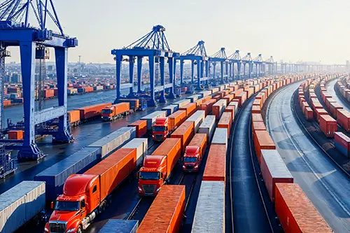 busy-cargo-port-with-shipping-containers-trucks