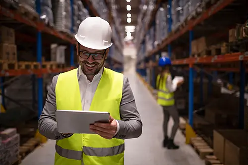 warehouse-supervisor-reading-report-tablet-about-successful-delivery-distribution-warehouse-logistics-center